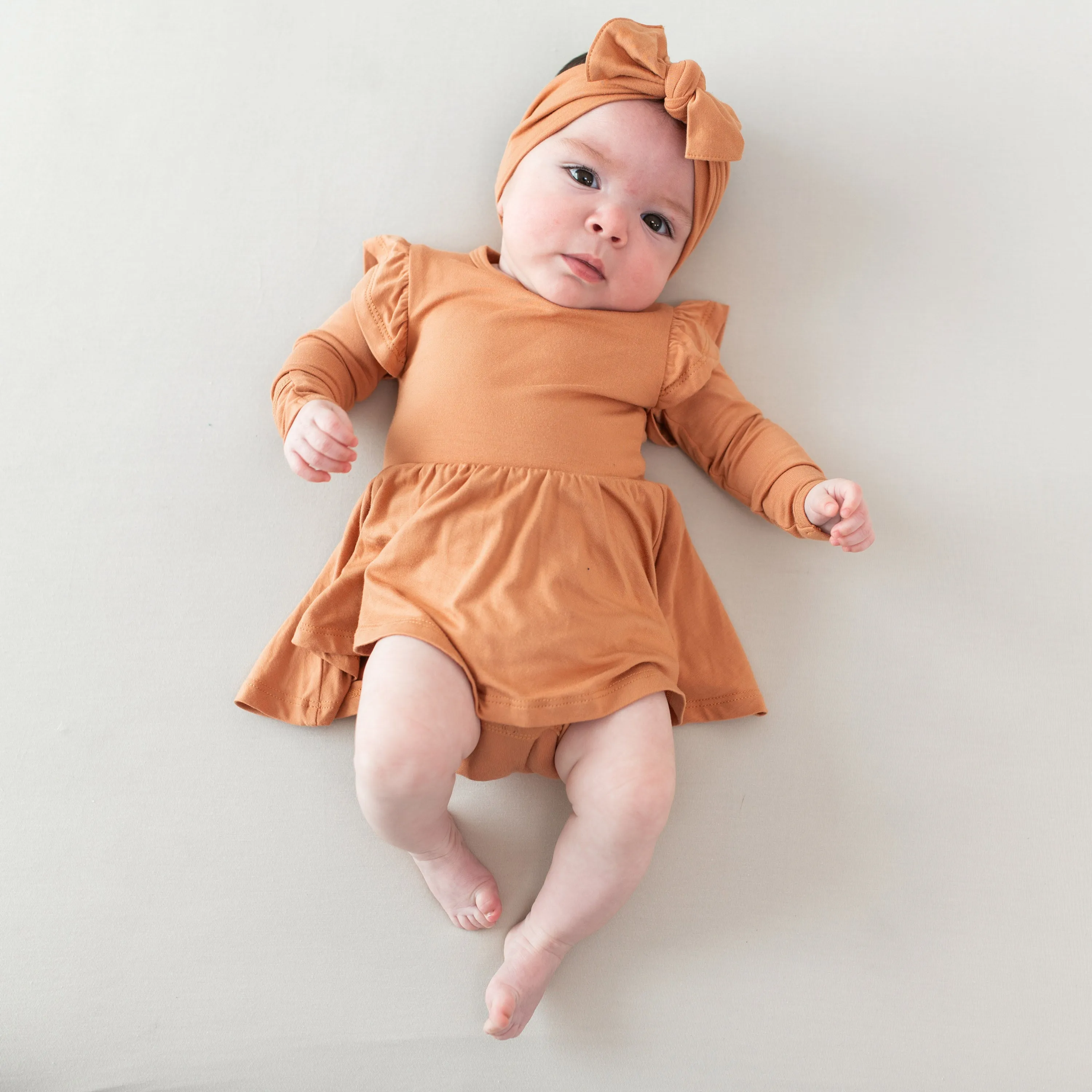 Long Sleeve Twirl Bodysuit Dress in Apricot